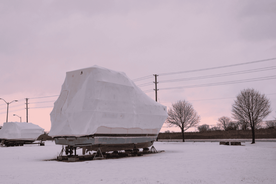 Boat in cold storage with marine shrink wrap cover on it. 