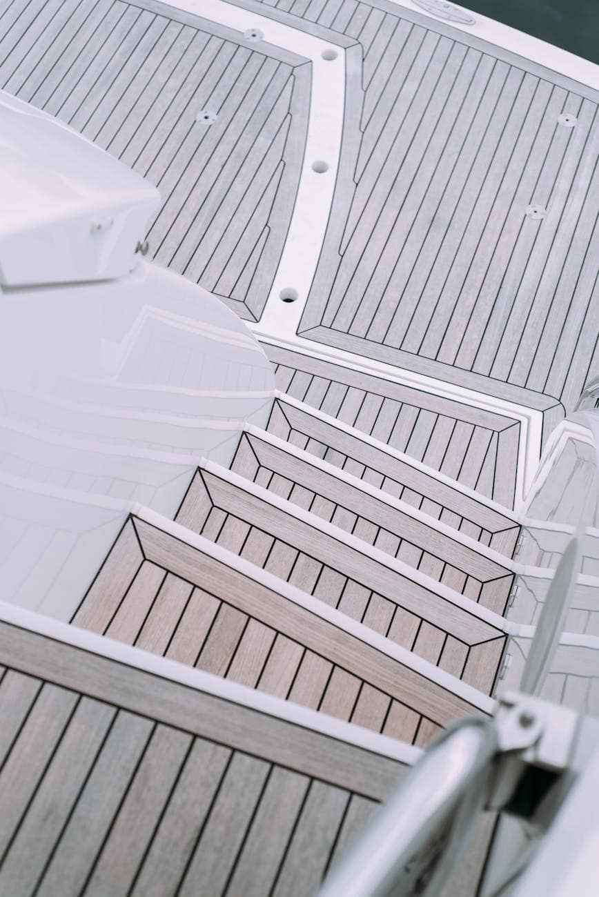 Teak stairs leading to teak swim platform on yacht