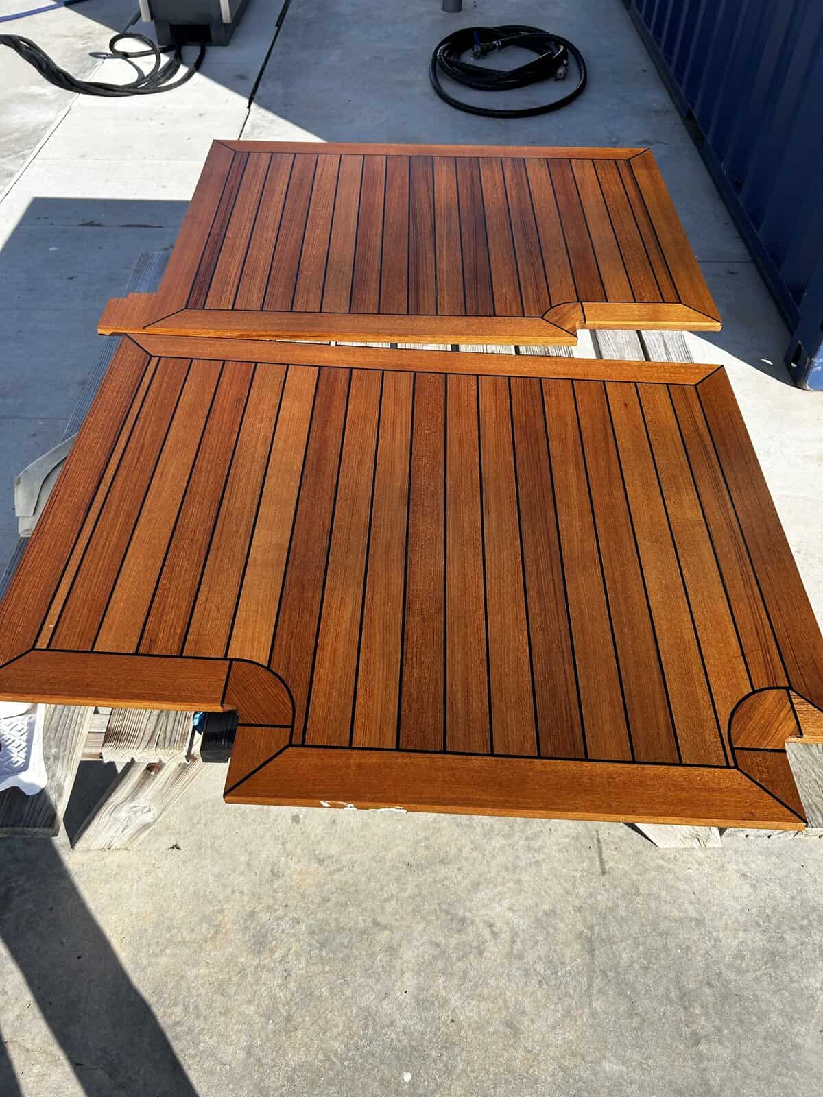 Sealed teak deck boards. 
