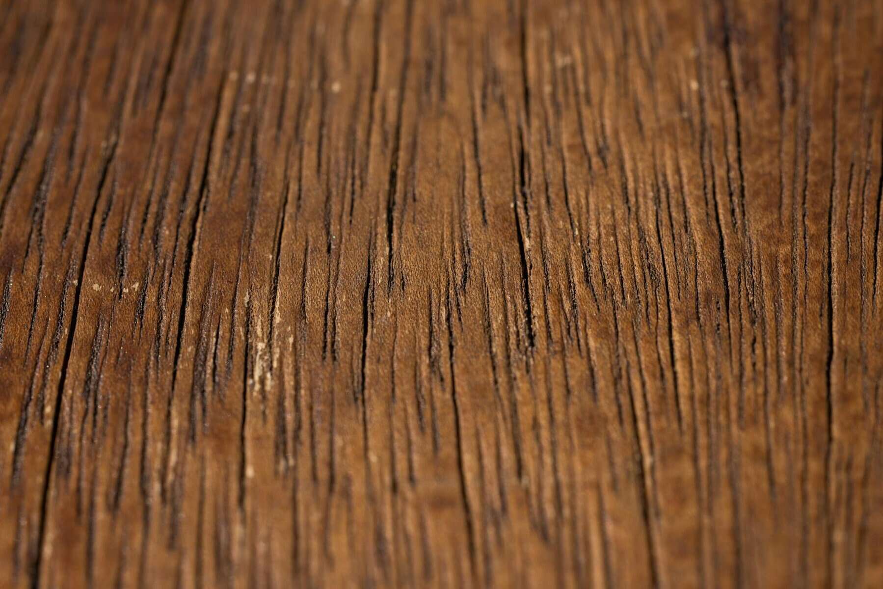 Dark teak showing open grain and teak wood profile. 