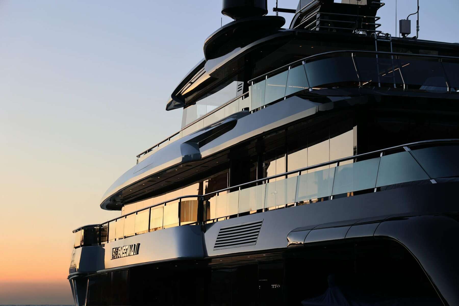 Grey marine paint on a superyacht at sunset