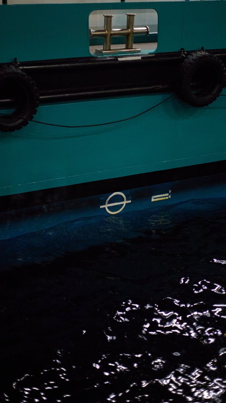 antifouling paint showing next to a blue hulls draft marks 