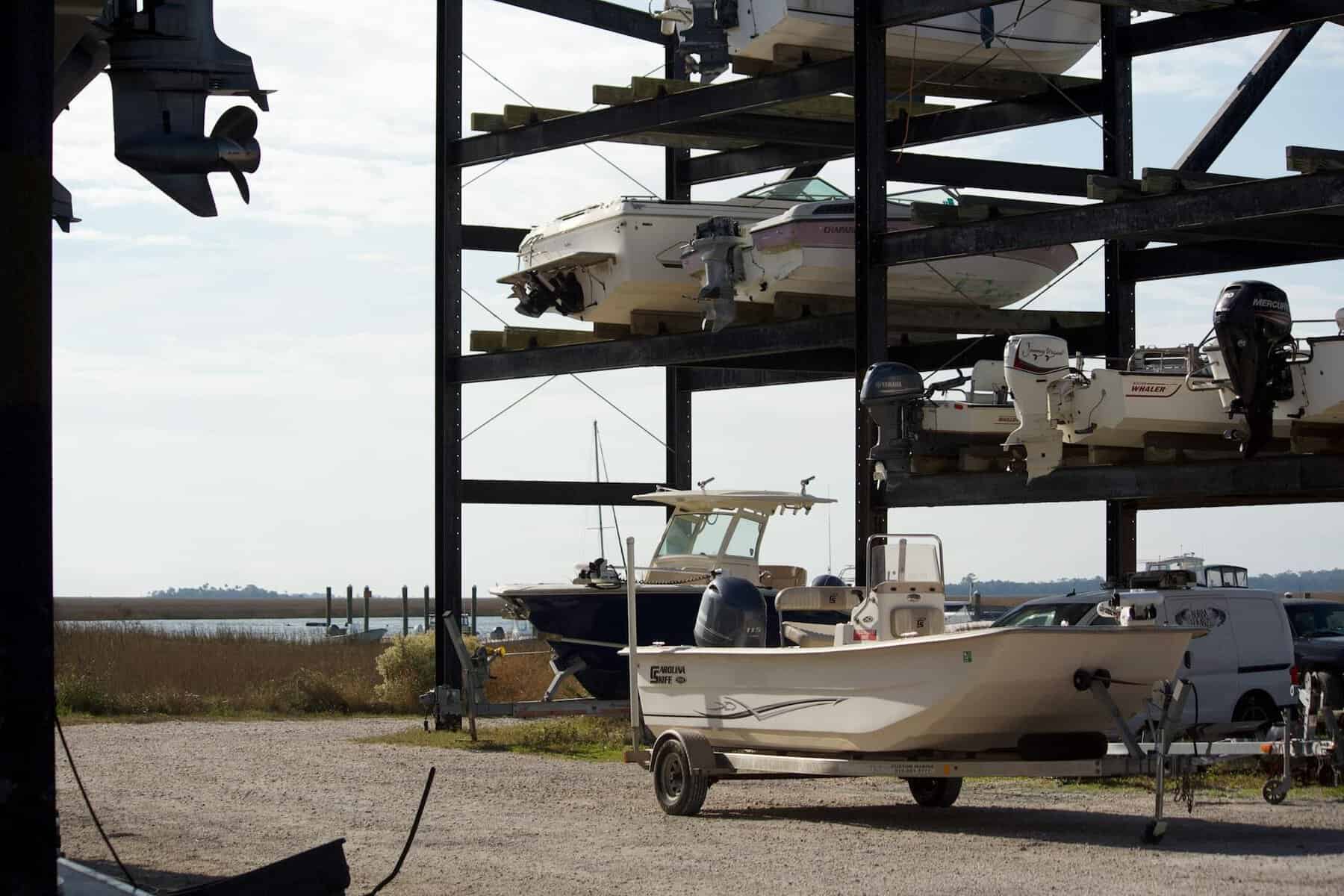 Boats in winter storage with outboard engines.  
