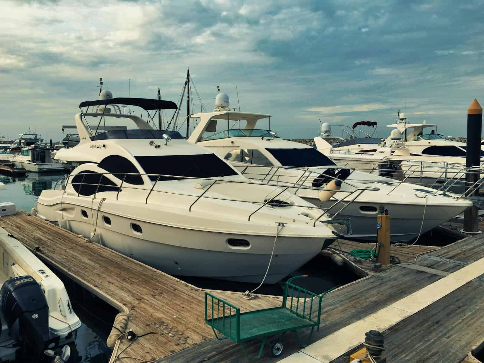 yachts docked on the harbour undergoing boat maintenance