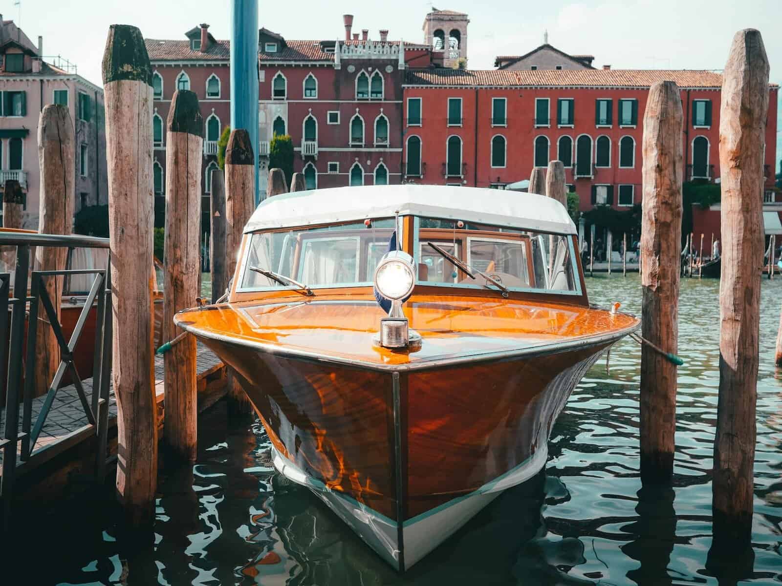 Varnished Italian speed boat docked. 