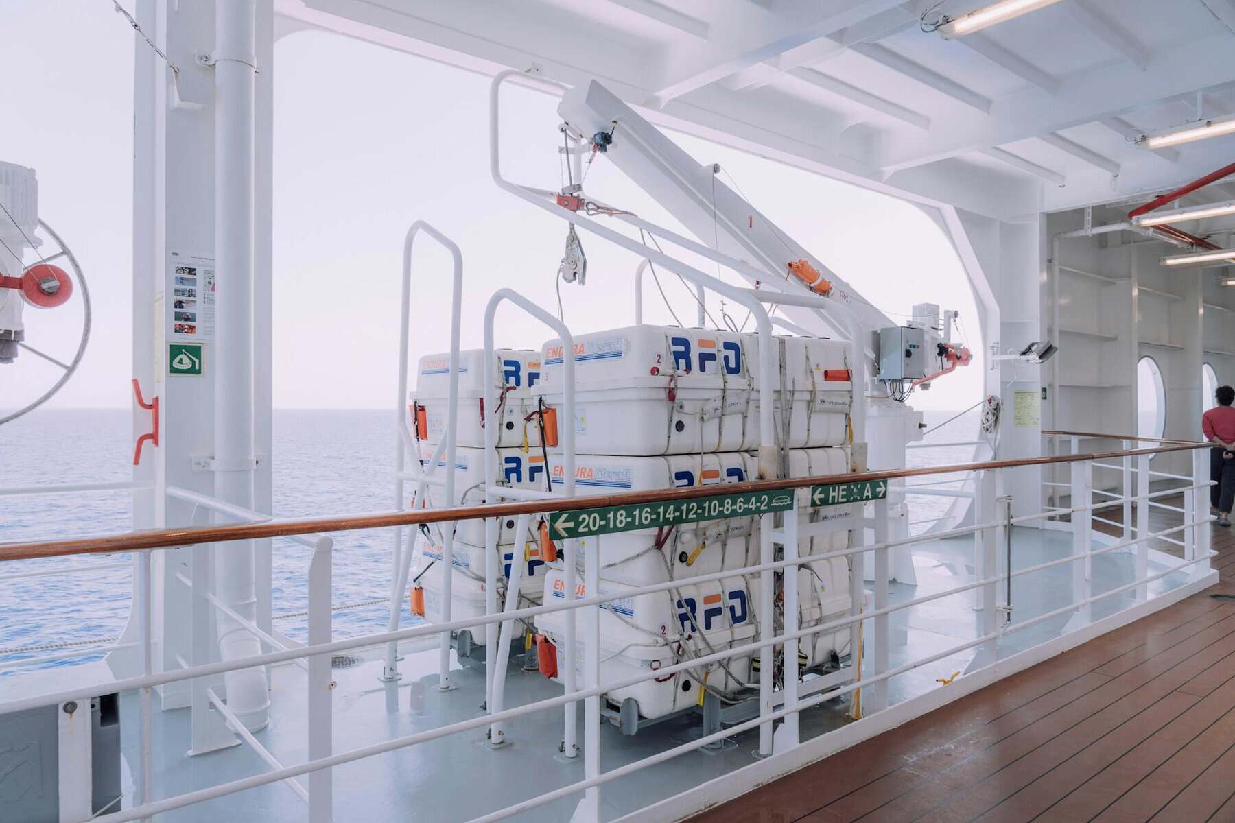inflatable liferafts and winch on a ship showing the safety equipment on boats. 