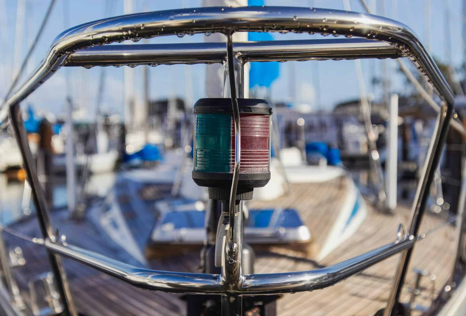 Yacht stainless and navigation light on the bow of a sailing boat. 