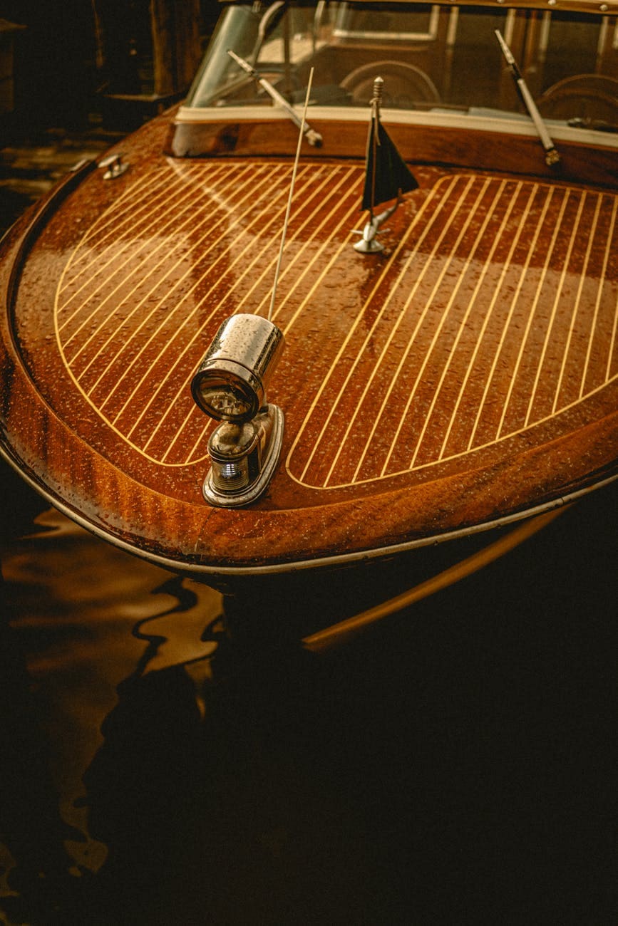 elegant retro boat on venice canal close up of its varnish. 