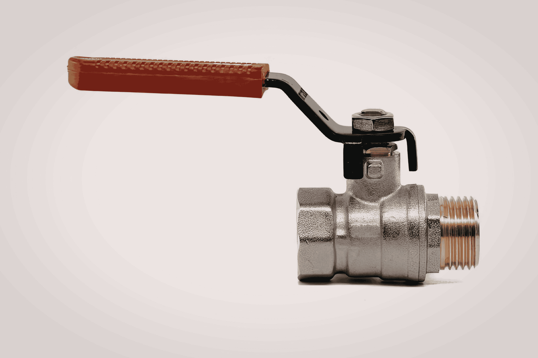 seacock ball valve with red handle and white background. 