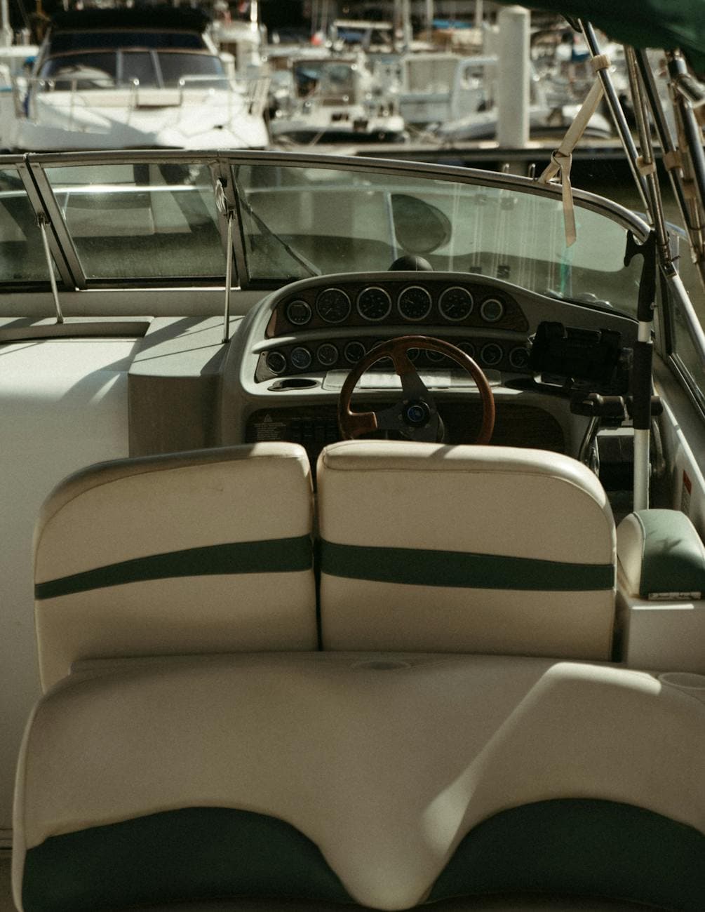 seats and steering wheel in motorboat