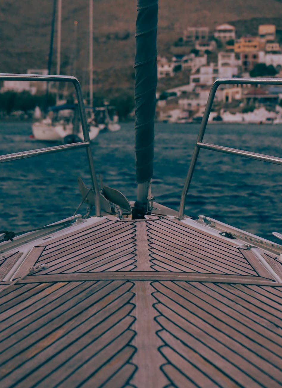 Teak yacht deck in herringbone pattern on a sailing yacht. 