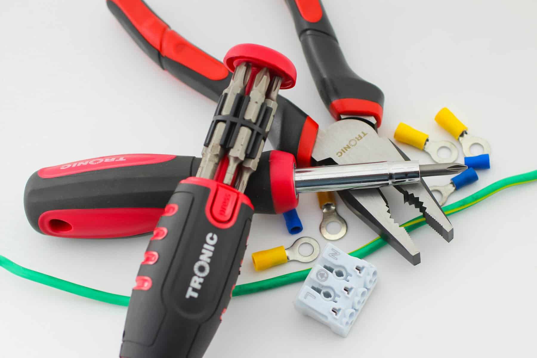 Marine Electrical tools on a white surface. Terminals and earthing wire. 