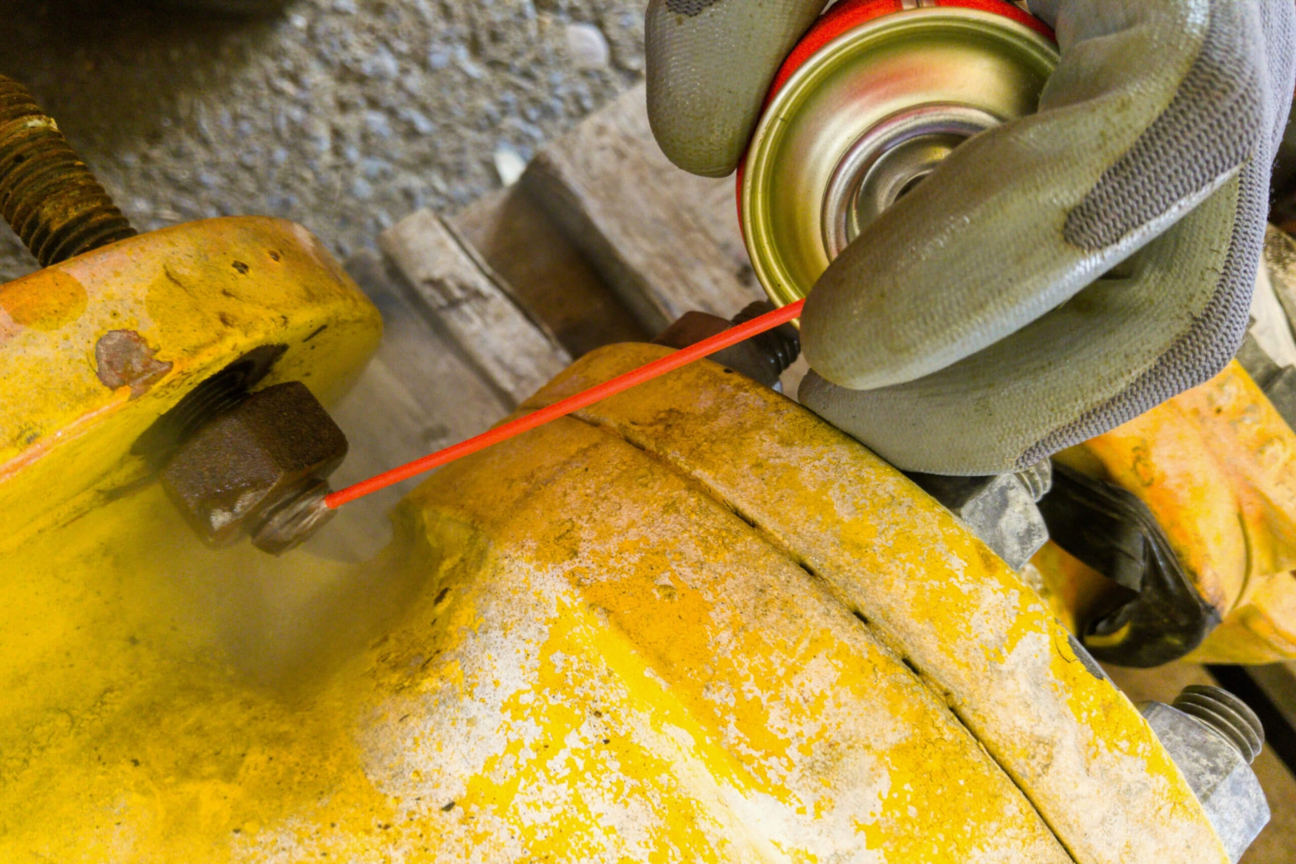 Marine degreaser being sprayed on a bolt. 