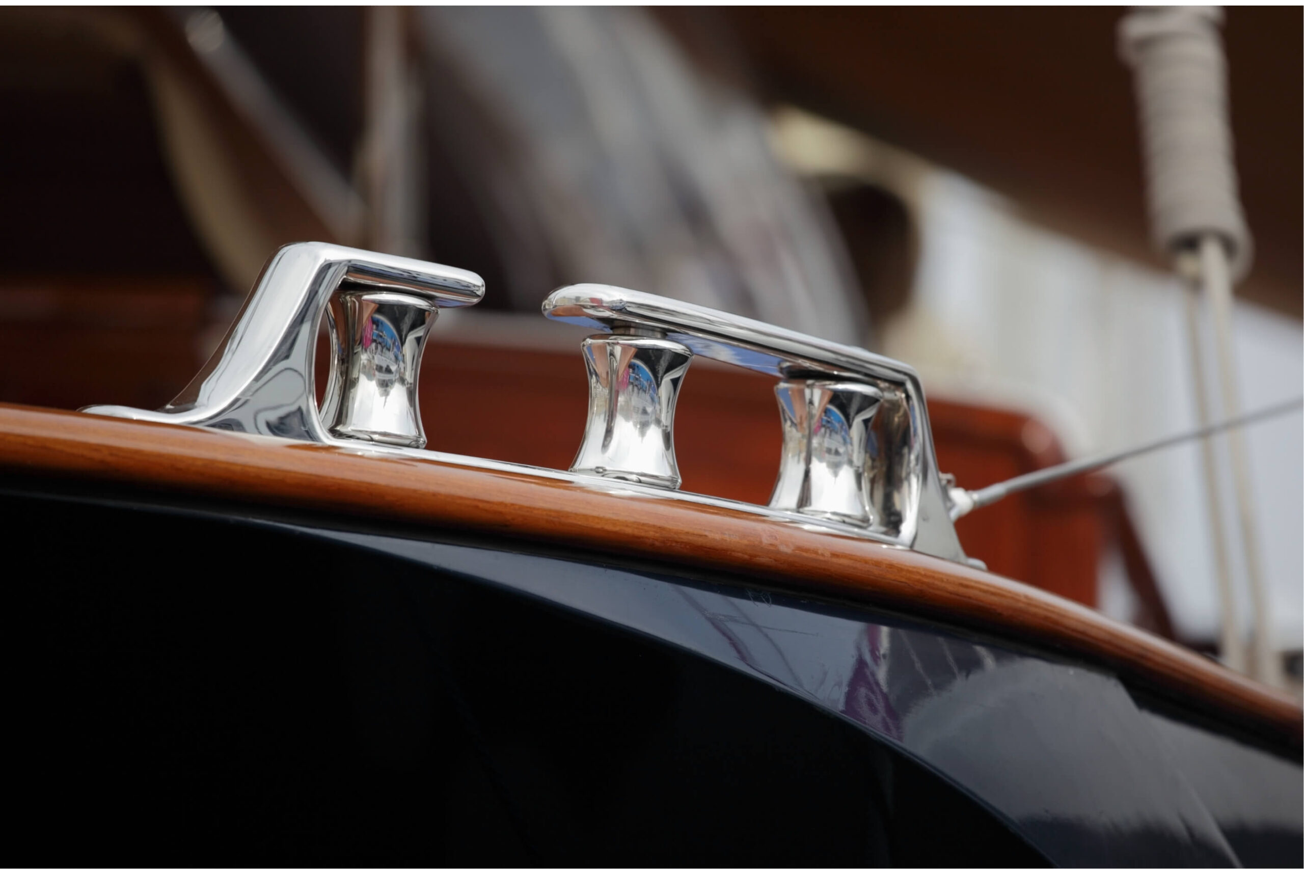 Blue Polished Boat hull with shinny stainless cleat. 